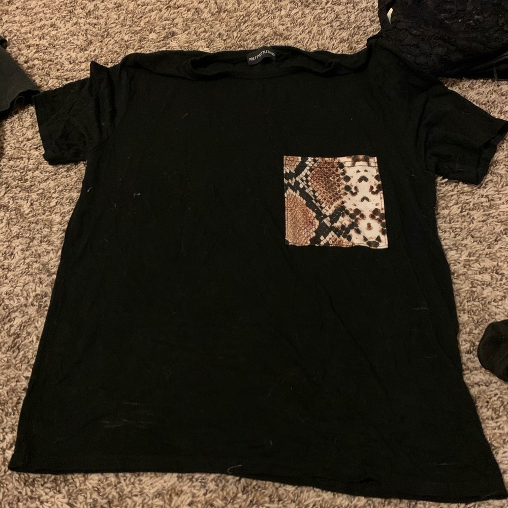Black T-shirt with snake skin pocket